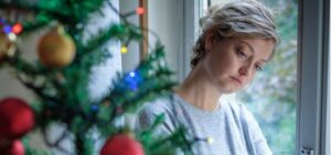 woman feeling depressed during christmas days picture id1070506332